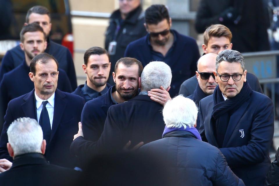 Juventus defender Giorgio Chiellini looked upset as he arrived for the funeral with Juventus team-mates and his maanager Massimiliano Allegri, left