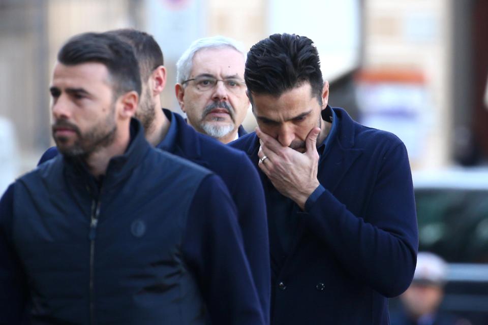 Buffon appeared visibly moved as he walked into the funeral