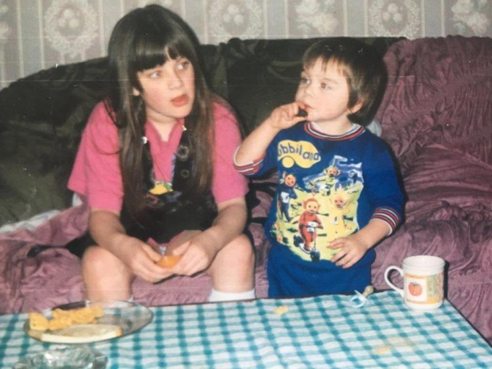  Natasha and her youngest brother Alan, who died in a house fire in 2005, as children