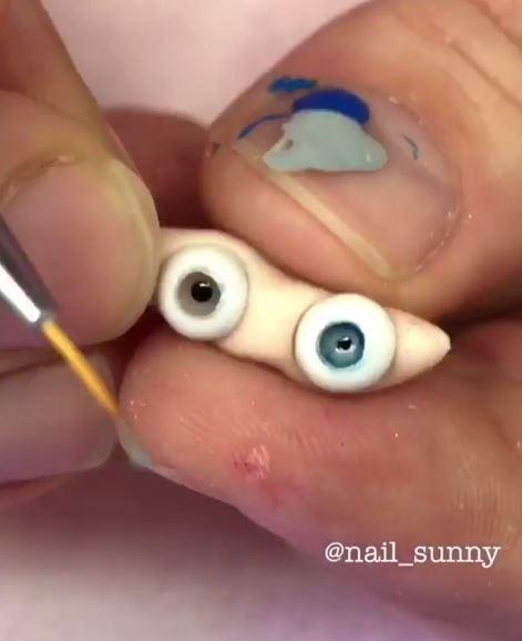 Nail Sunny, who describes herself as the number one nail artist in Russia, delicately hand-painted the eyeballs