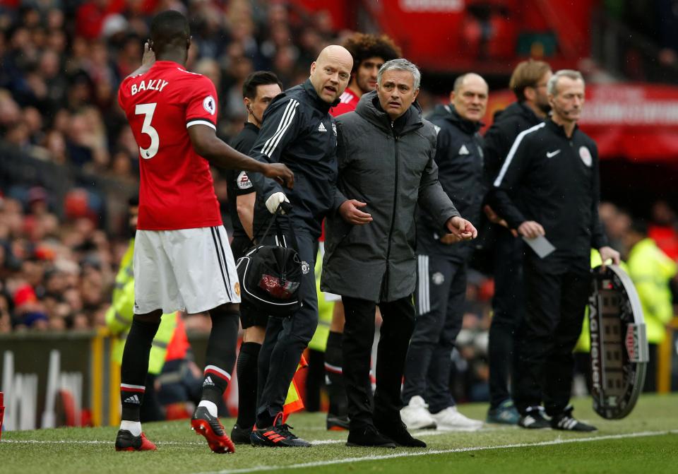  Mourinho and Bailly on the touchline at Old Trafford.