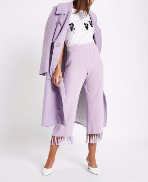  Keep your lilac feminine with these tasselled trousers