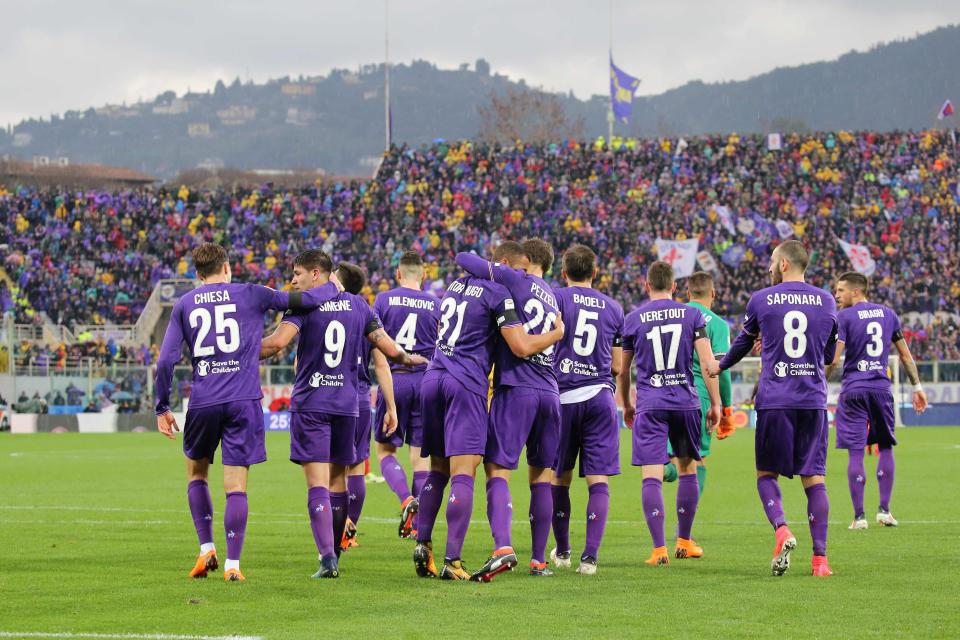 Fiorentina players celebrate the goal in memory of Davide Astori together