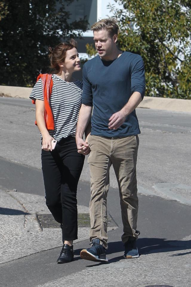  Emma Watson looks completely loved-up as she enjoys a stroll with partner Chord Overstreet