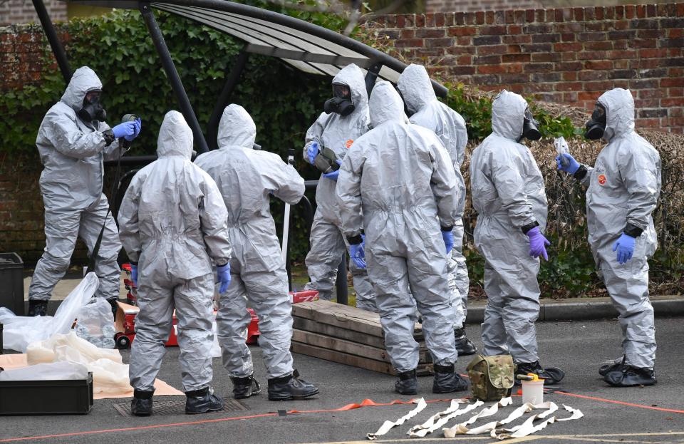  Military in protective clothing prepare to remove vehicles from a car park in Salisbury, earlier this week