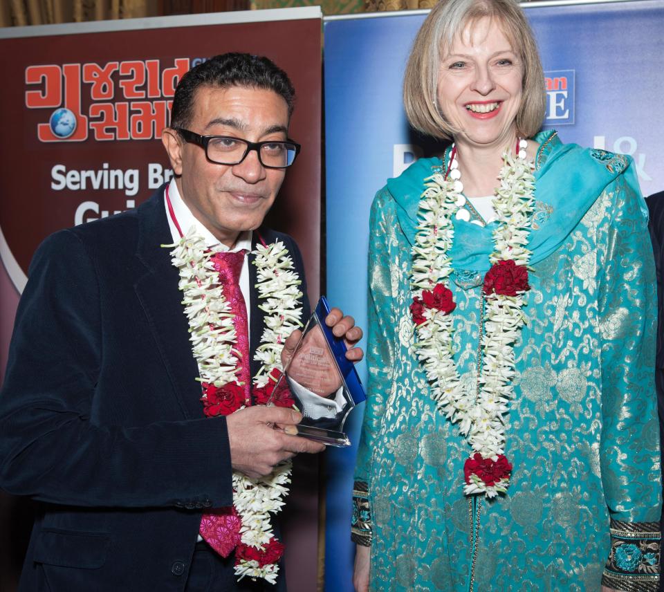 Dr Sunil Chopra met PM Theresa May in 2013 when he won Professional of The Year award