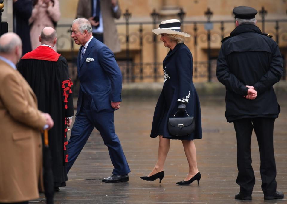  Prince Charles and his wife Camilla walking into the event