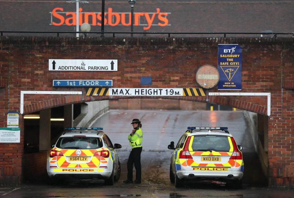  Two police cars block the entrance to Sainsbury's car park in Salisbury today