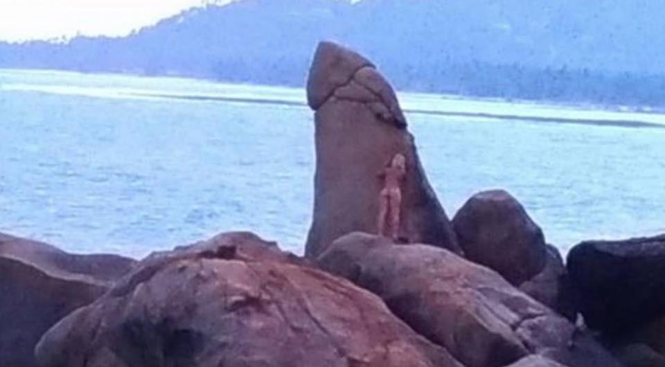  The woman then seemed to to rub herself against the rock