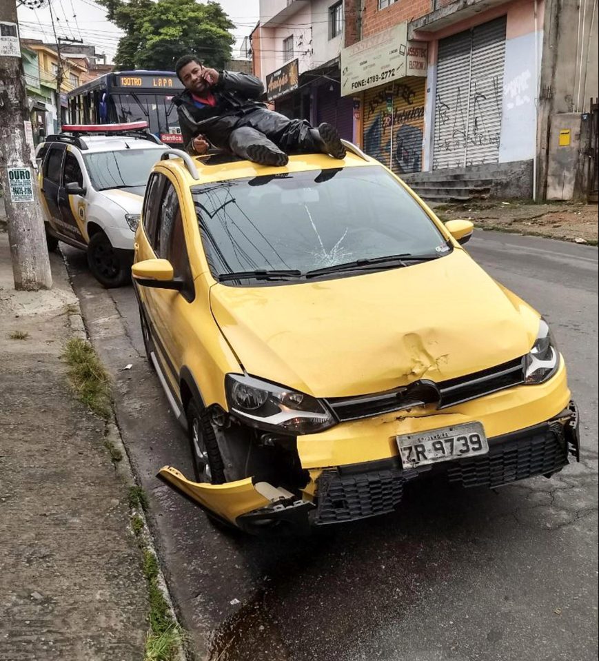  Incredibly, nearby snappers caught the motorcyclist phoning for his own ambulance