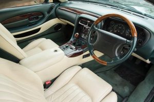  Inside there are four cream leather seats, with green leather door linings and dashboard