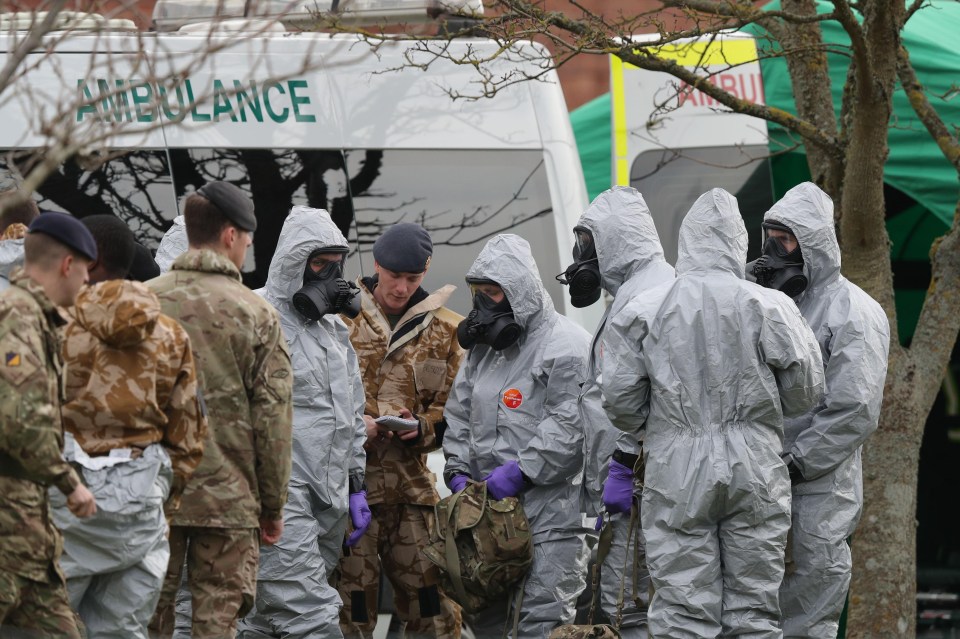 Soldiers wearing protective clothing at an address in Gillingham