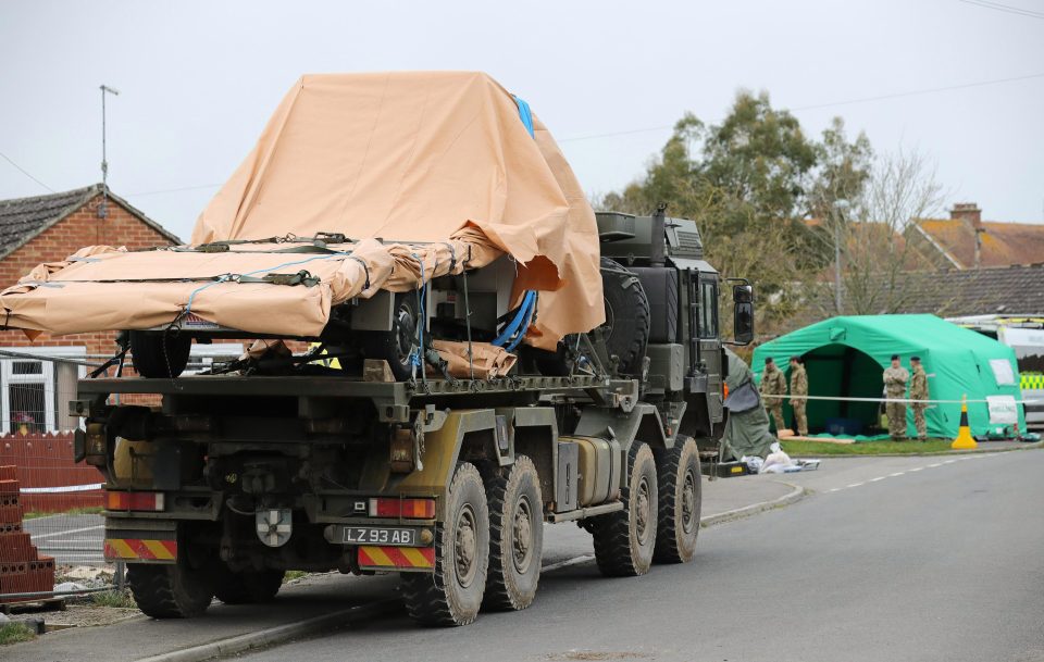 A recovery truck used to take away the car of a poisoned Russian spy was itself loaded onto an lorry today 