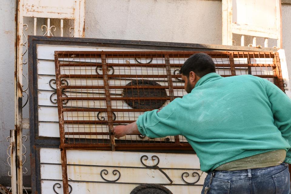  Rambo shows one of the cell doors they removed from the prison ISIS turned the hotel into