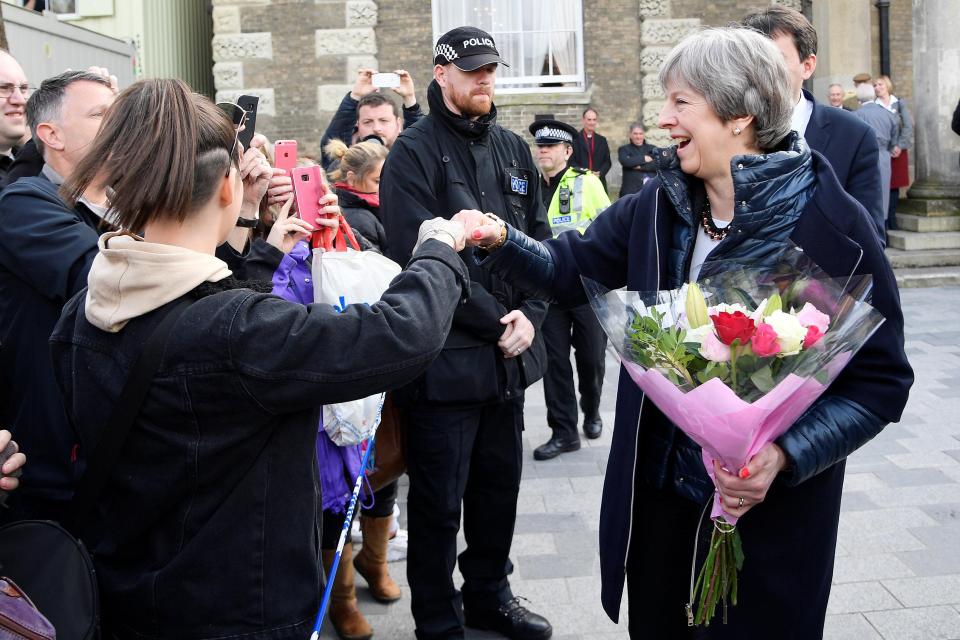  Mrs May did a fist bump with a member of the public in Salisbury