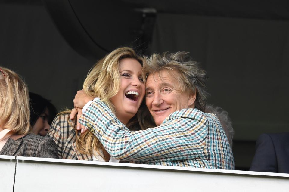  Rock old-timer Rod's onto a winner hugging wife Penny Lancaster while in matchy-matchy tartan blazers