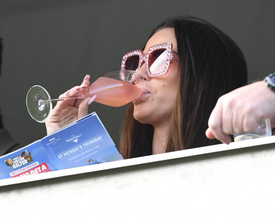  She was seen downing fizz in the VIP area