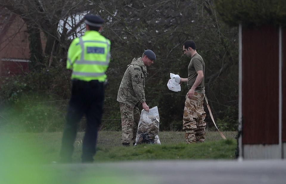  The military were also seen bagging up items