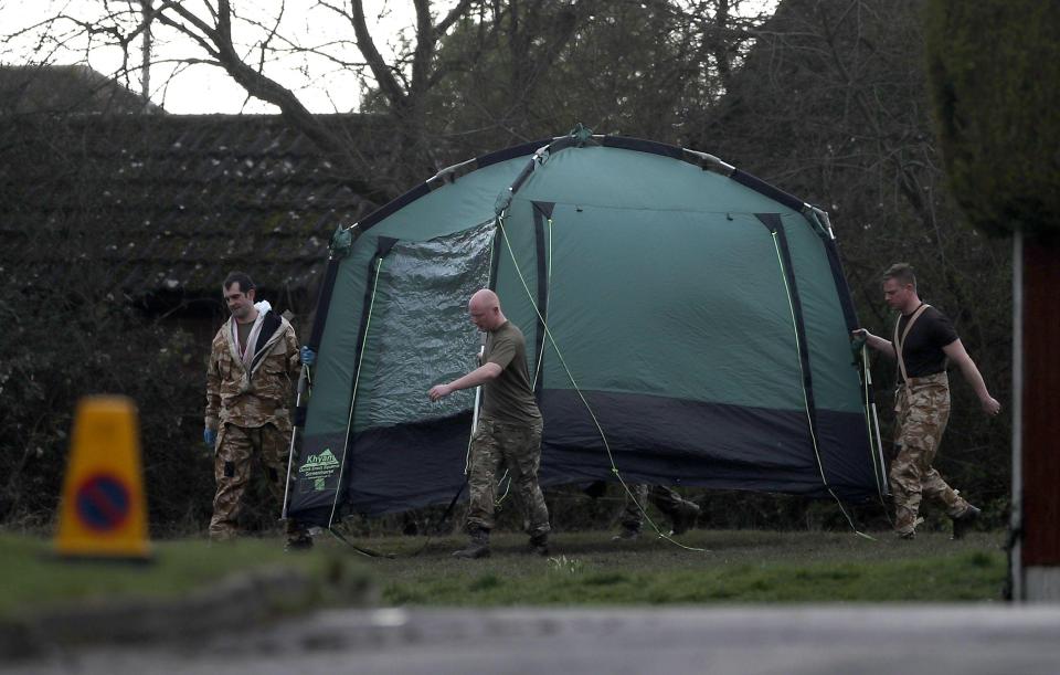  A green tent has been erected close to where the officer lives