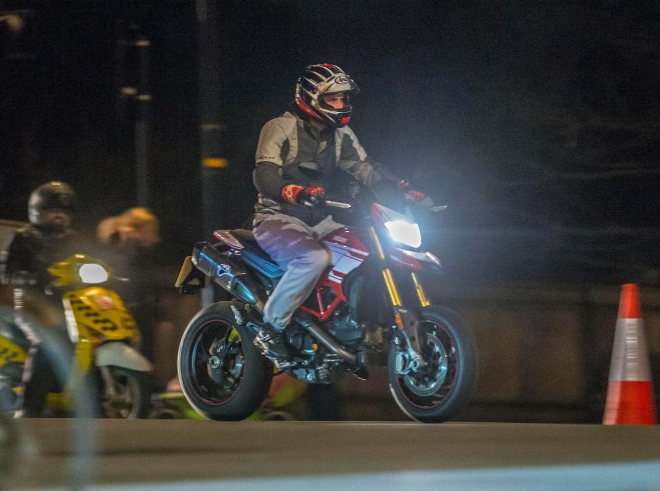  Prince William arrives to play football on a £14,000 Ducati motorbike