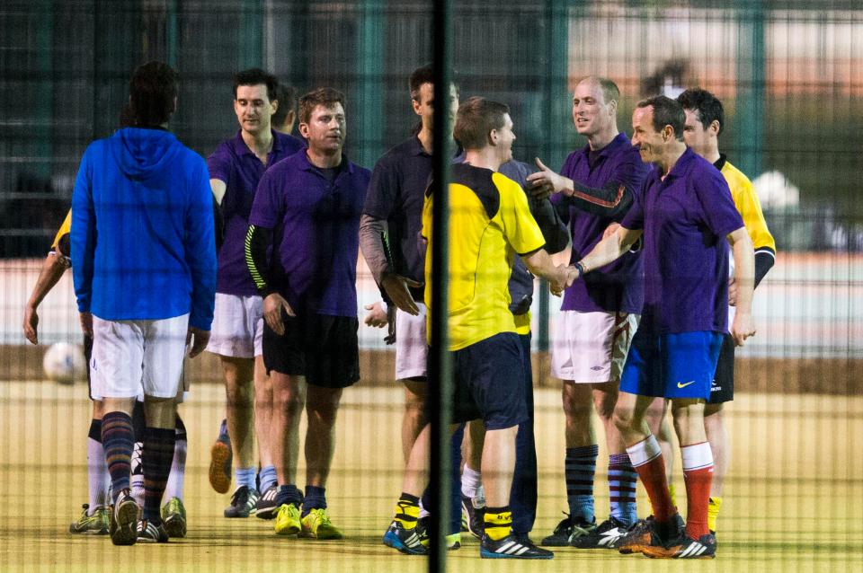  It's all smiles at the end as the players shake hands with each other