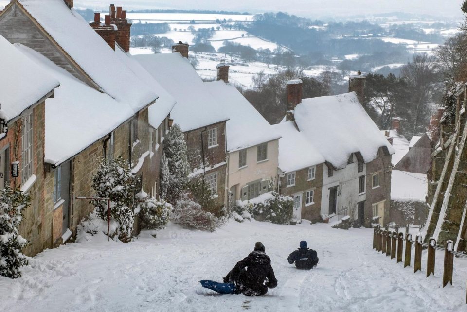  Not everyone found the snow a problem with some sledging down Gold Hill in Shaftesbury, Dorset