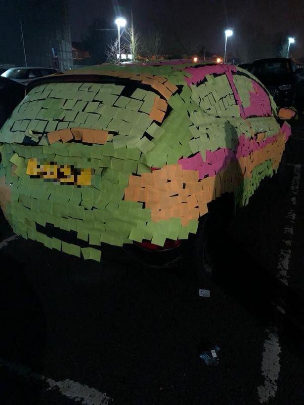  The car was completely covered in the post-it notes