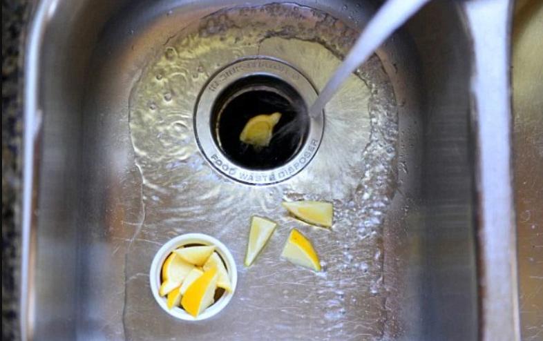  To give your food waste disposer an extra clean, put some baking soda and white vinegar into the drain. Follow with ice and coarse salt and then some wedges of lemon