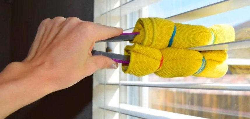  Using a cloth attached to a pair of kitchen tongs to clean the blinds can save you a lot of effort