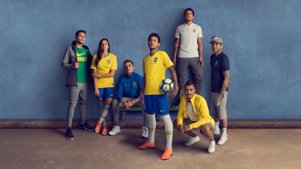  Paris Saint-Germain star Neymar models Brazil's new home kit