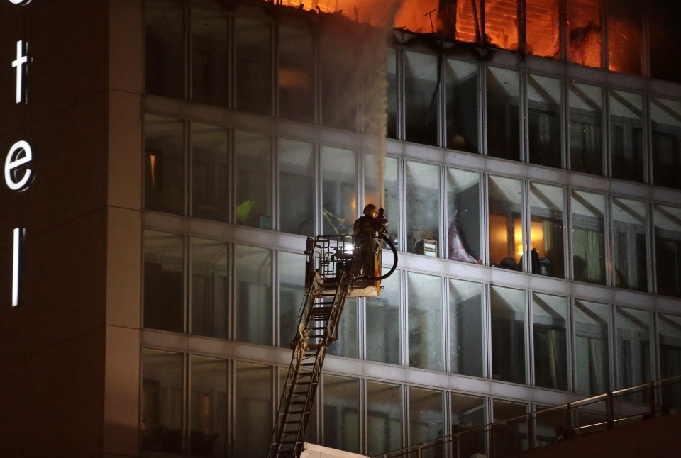 Fire fighters used ladders to tackle a multi-storey blaze at the north Dublin hotel