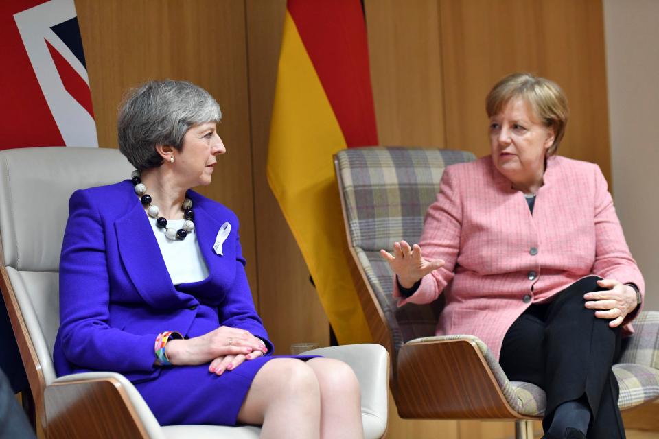  Angela Merkel was one of several leaders to express solidarity with the UK after meeting Mrs May and Emmanuel Macron on the margins of the summit