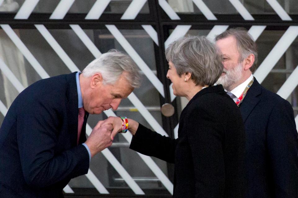  Theresa May was greeted with a kiss on the hand from the EU’s chief negotiator Michel Barnier