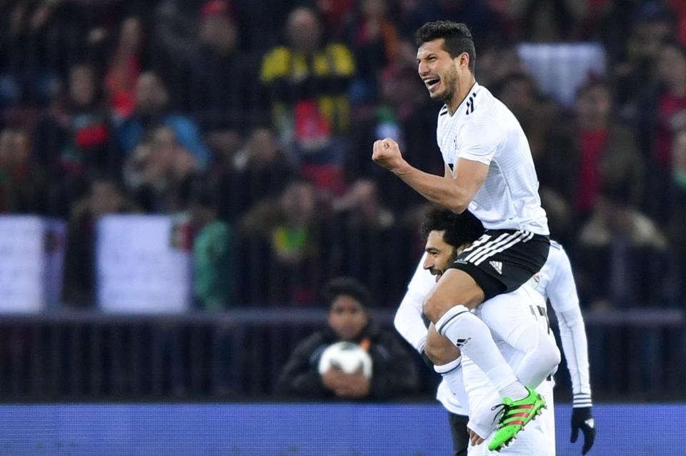  Tarek Hamed reacts with the Reds forward after he broke the deadlock