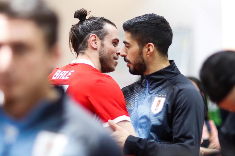  Gareth Bale and Luis Suarez exchange pleasantries before the game