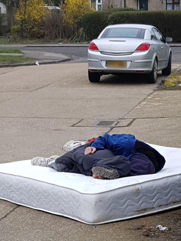  The unknown homeless couple were photographed on the fly-tipped mattress