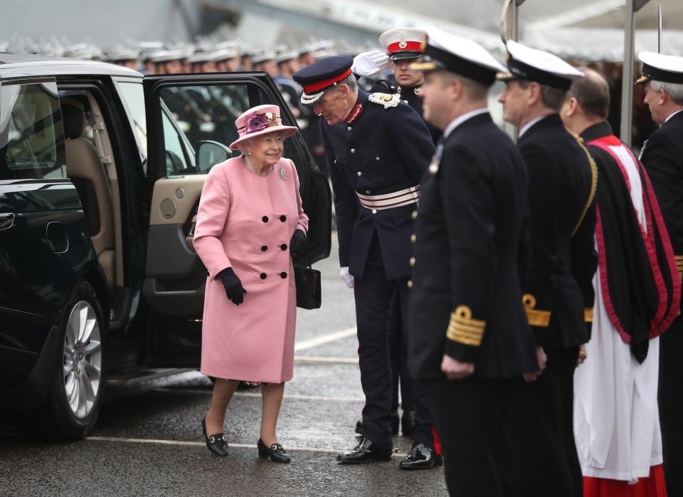  The Queen arrives at the ceremony dressed in a blush pink coat and hat