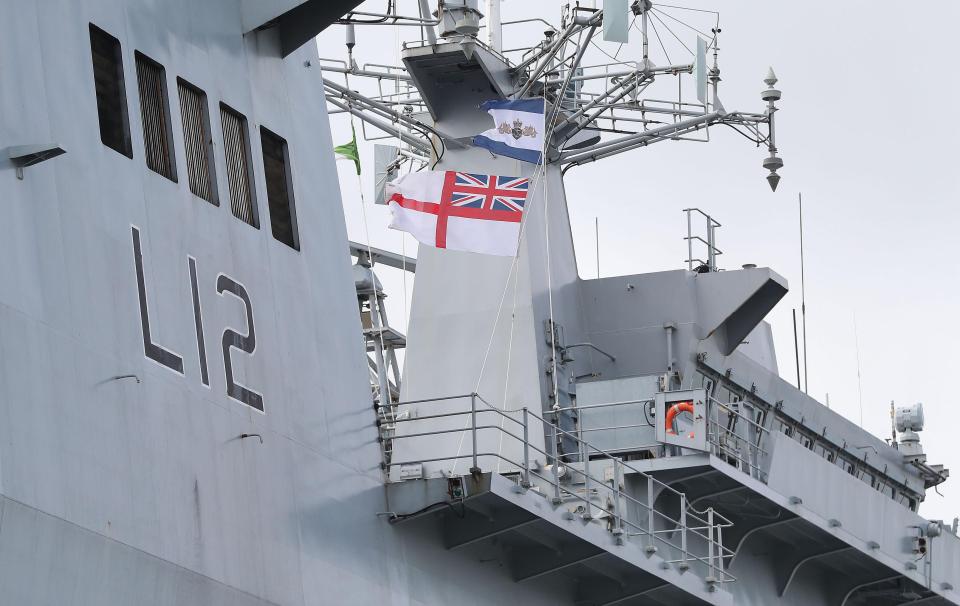  The Ensign is lowered at the decommissioning ceremony for HMS Ocean at HMNB Devonport in Plymouth