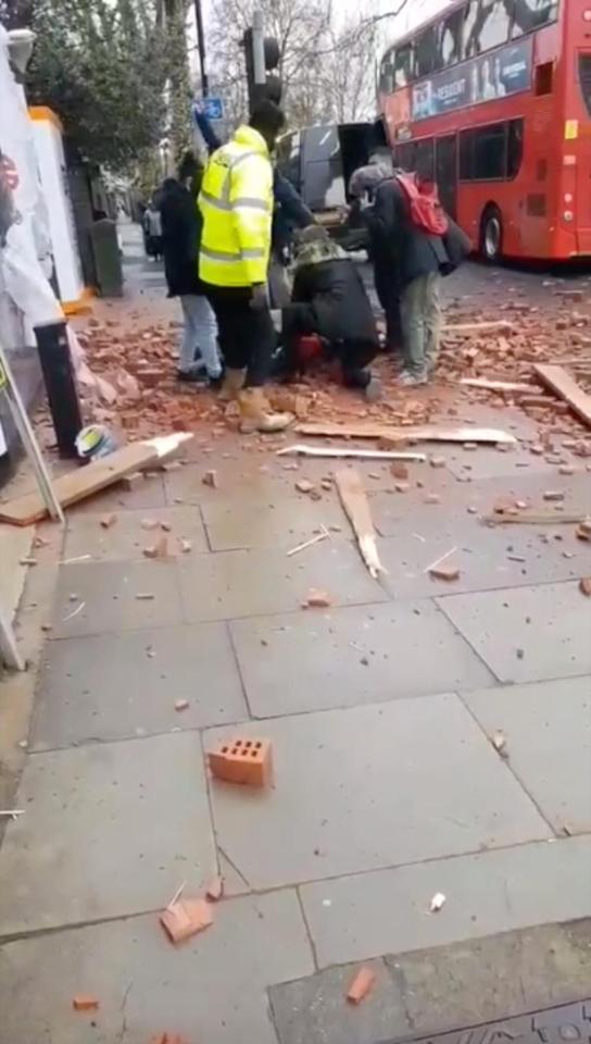  A woman is in a critical condition after apparently being hit by debris falling from a building site crane this morning