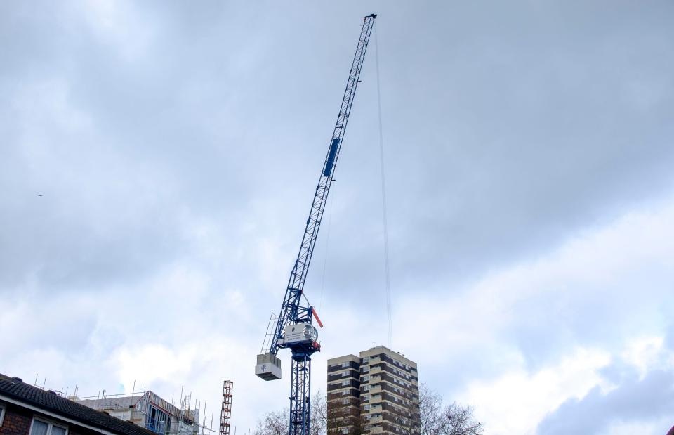  The bricks and wood reportedly fell from a crane at the site