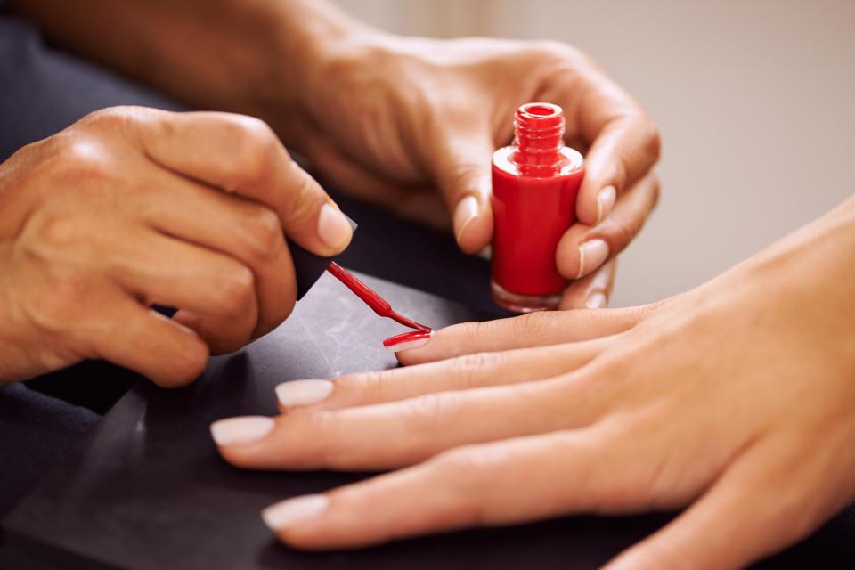  Women are being urged to wear sunscreen or fingerless gloves to the salon to protect their skin from the UV light