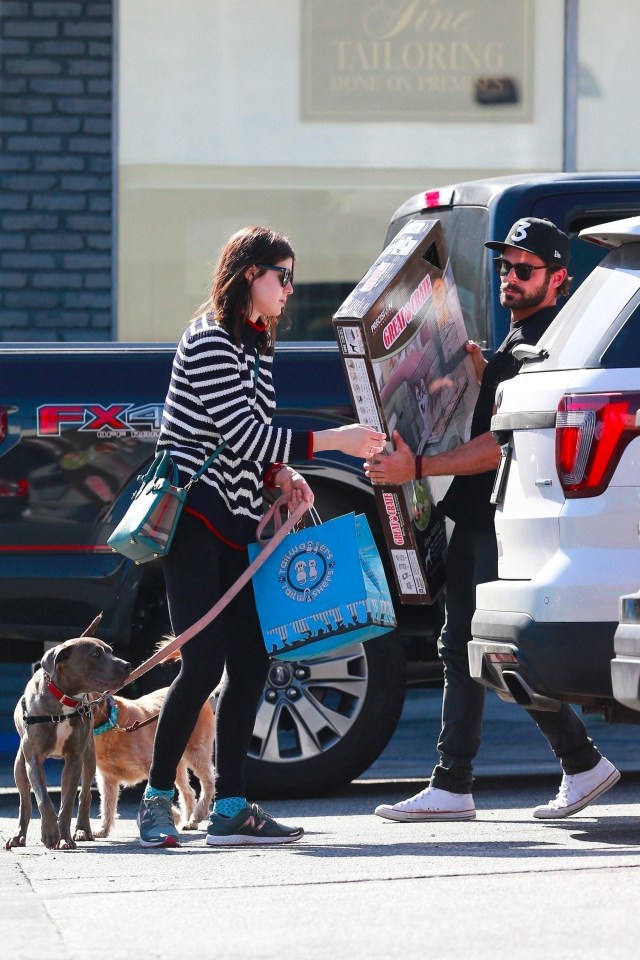 The pair looked close as they picked up doggie treats