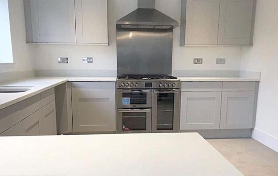  John showed of the pair's sleek kitchen on Instagram