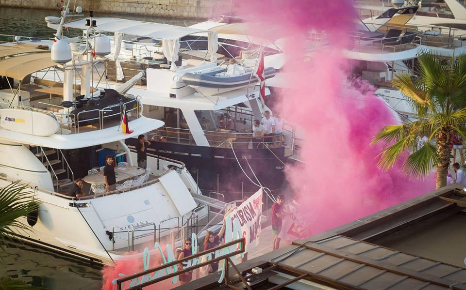  The protesters set off pink flares near luxury yachts in the Palma marina in the peak summer season