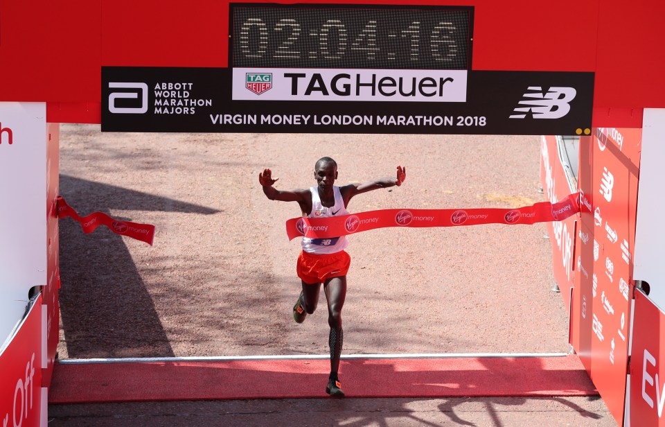 Eliud Kipchoge crosses the line in 2018 to win the men’s event