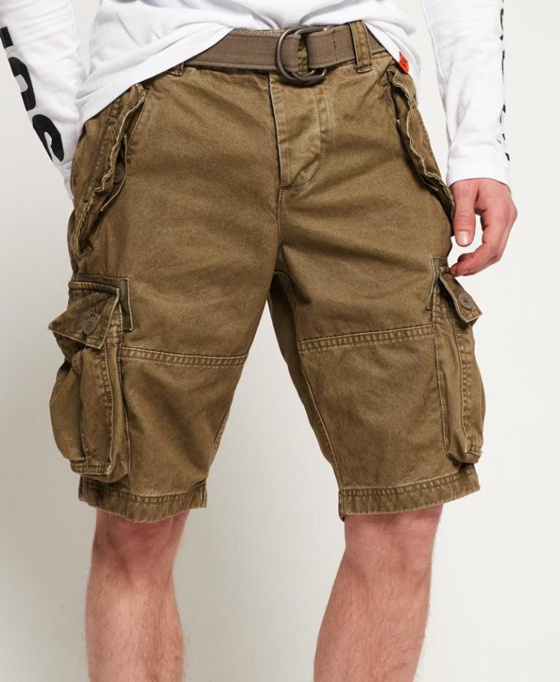  Military-inspired shorts with six button-fastened pockets, a button fly fastening and belt