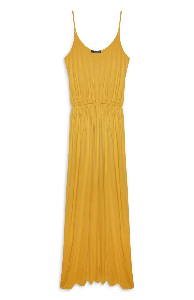  Primark is selling a budget version, pictured, of Marissa Webb's mustard maxi dress