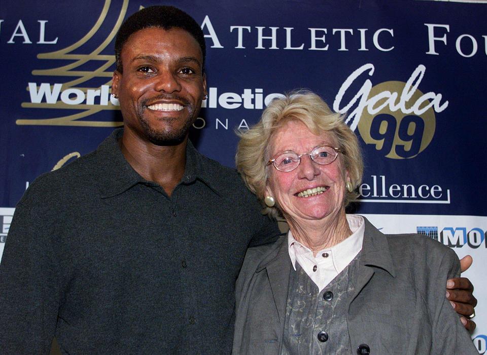  Blankers-Koen, pictured with Carl Lewis, remained in athletics after retiring