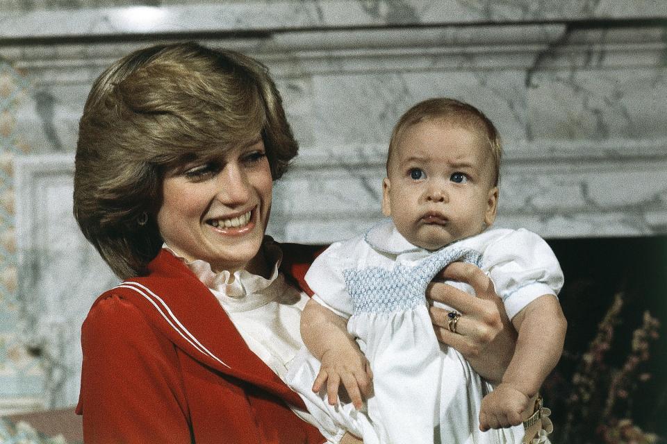  A proud Princess Diana shows off a tiny Prince William