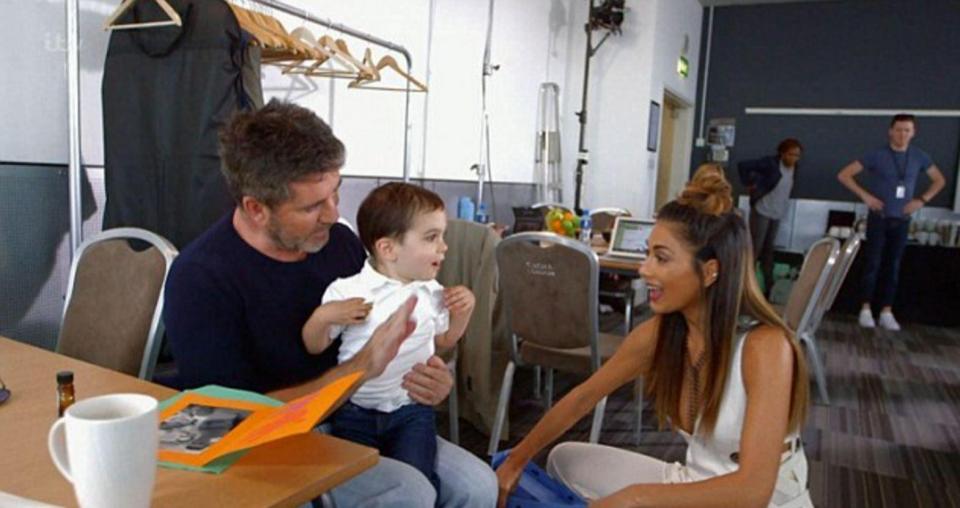 Simon and Nicole with little Eric, who is getting ready to take over the music world